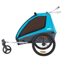 Thule Coaster XT Kinderanhänger Blue Umbaubar Zum Fahrradanhänger Und Kinderwagen 8 Thule Coaster XT Kinderanhänger Blue Umbaubar Zum Fahrradanhänger Und Kinderwagen -Baby Life Verkauf large thule coaster xt blue side 10101803
